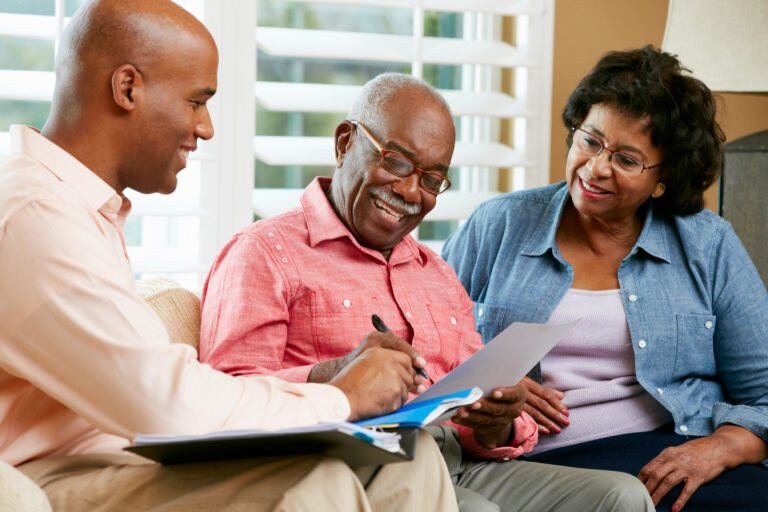 Senior Couple Looking at Long-Term Care Insurance - Harmony at Home Senior Care