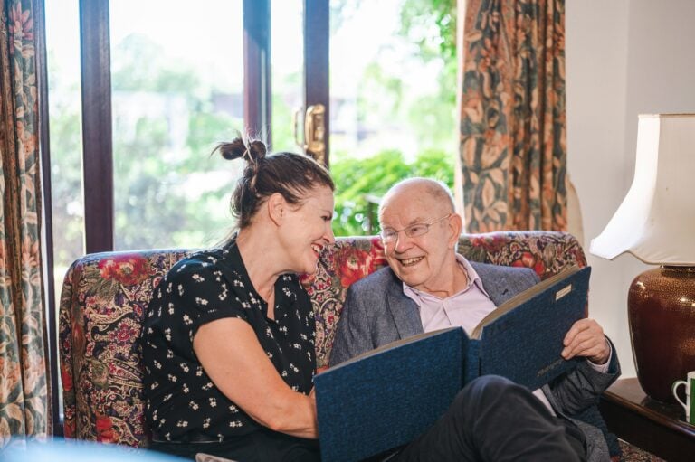 difference between home health and home care caregiver helping senior at home
